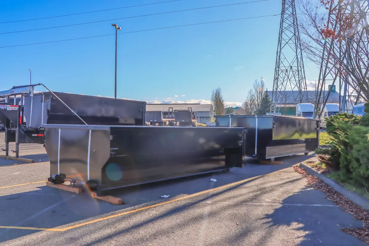 Roll-off dumpster ready for waste disposal at job site for 2 Yard Dumpster Rental in Ammon